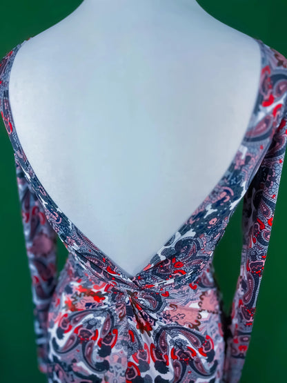 Elegant knit tango dress with deep v-back and knot detail