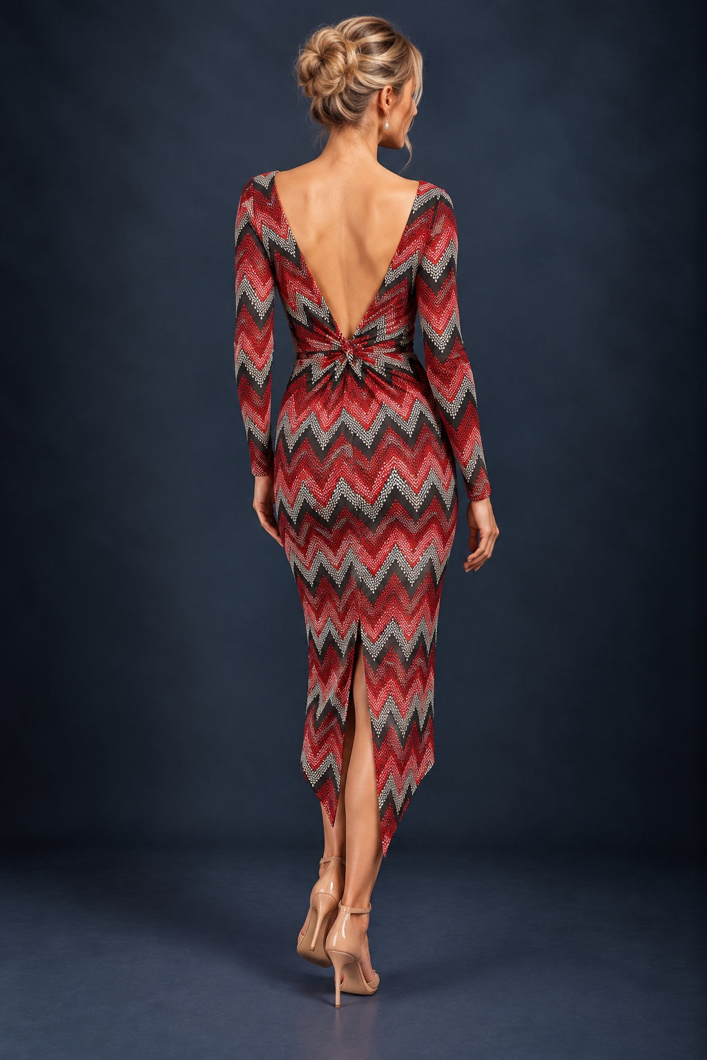 Back view of a women’s tango dress in silky textured stretch jersey with a deep V-shaped open back, decorative knot, asymmetric hem and back slit for freedom of movement.