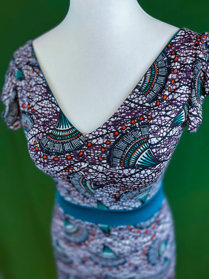 Graceful tango dress with wide skirt and back tail detail