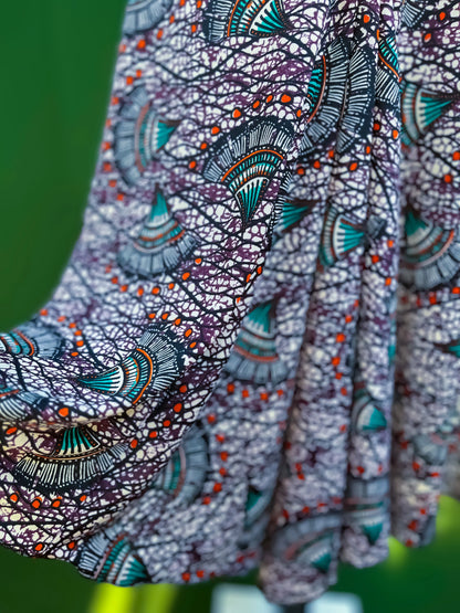 Graceful tango dress with wide skirt and back tail detail