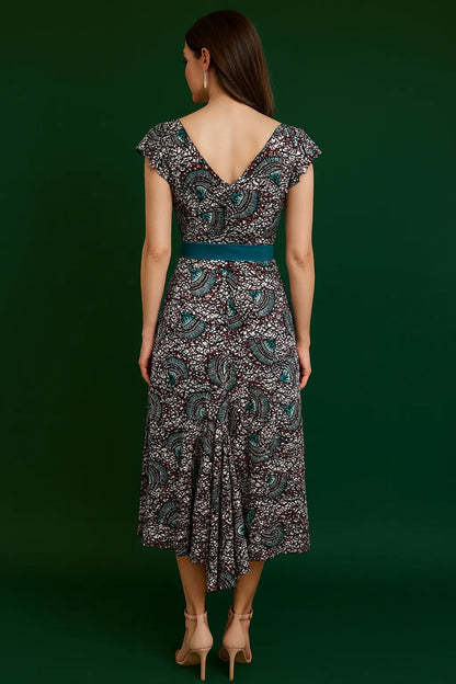 Graceful tango dress with wide skirt and back tail detail
