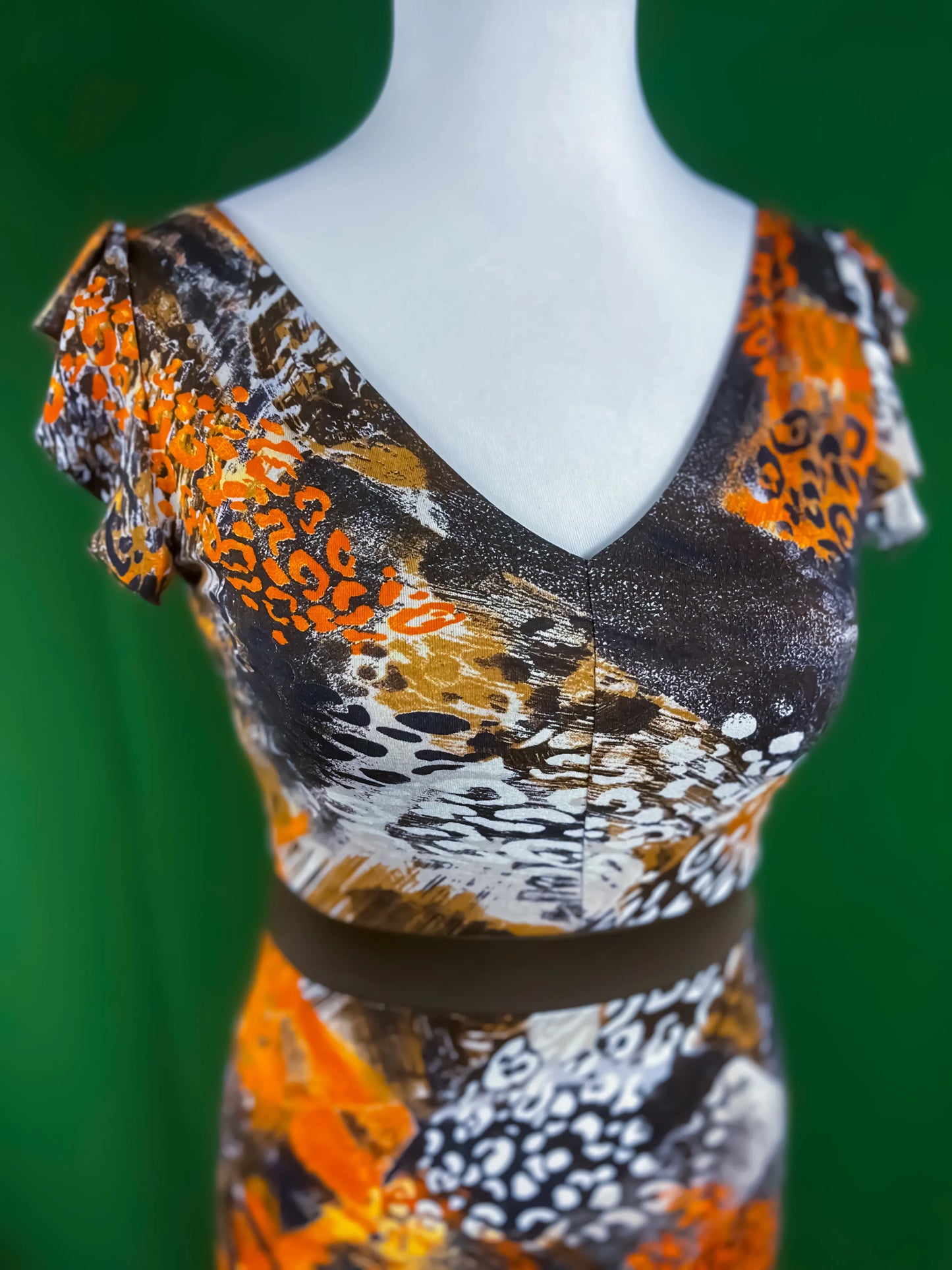 Charming lined tango gown with flutter sleeves and slit