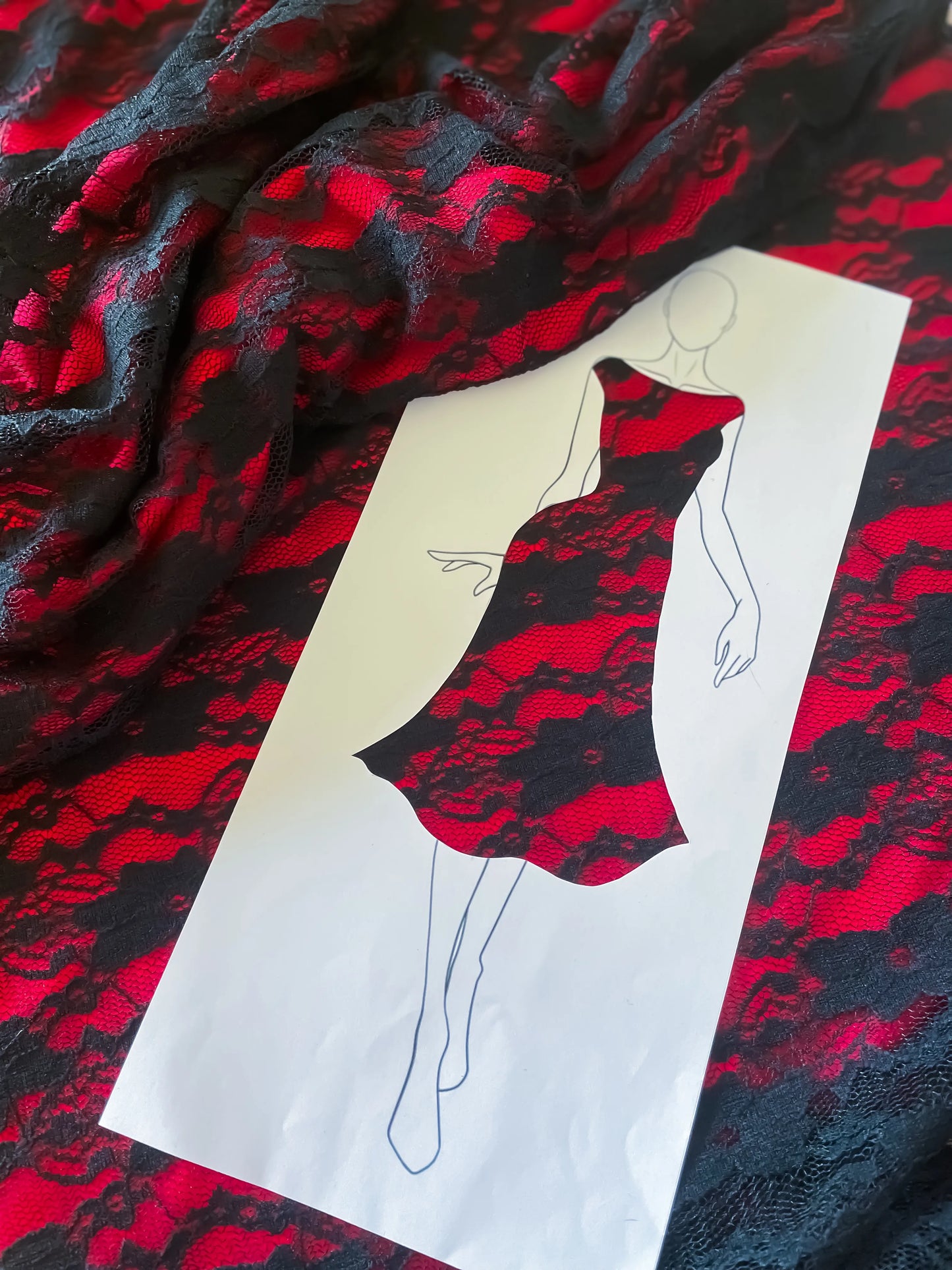 Black lace tango dress with bold red lining and back cut-out