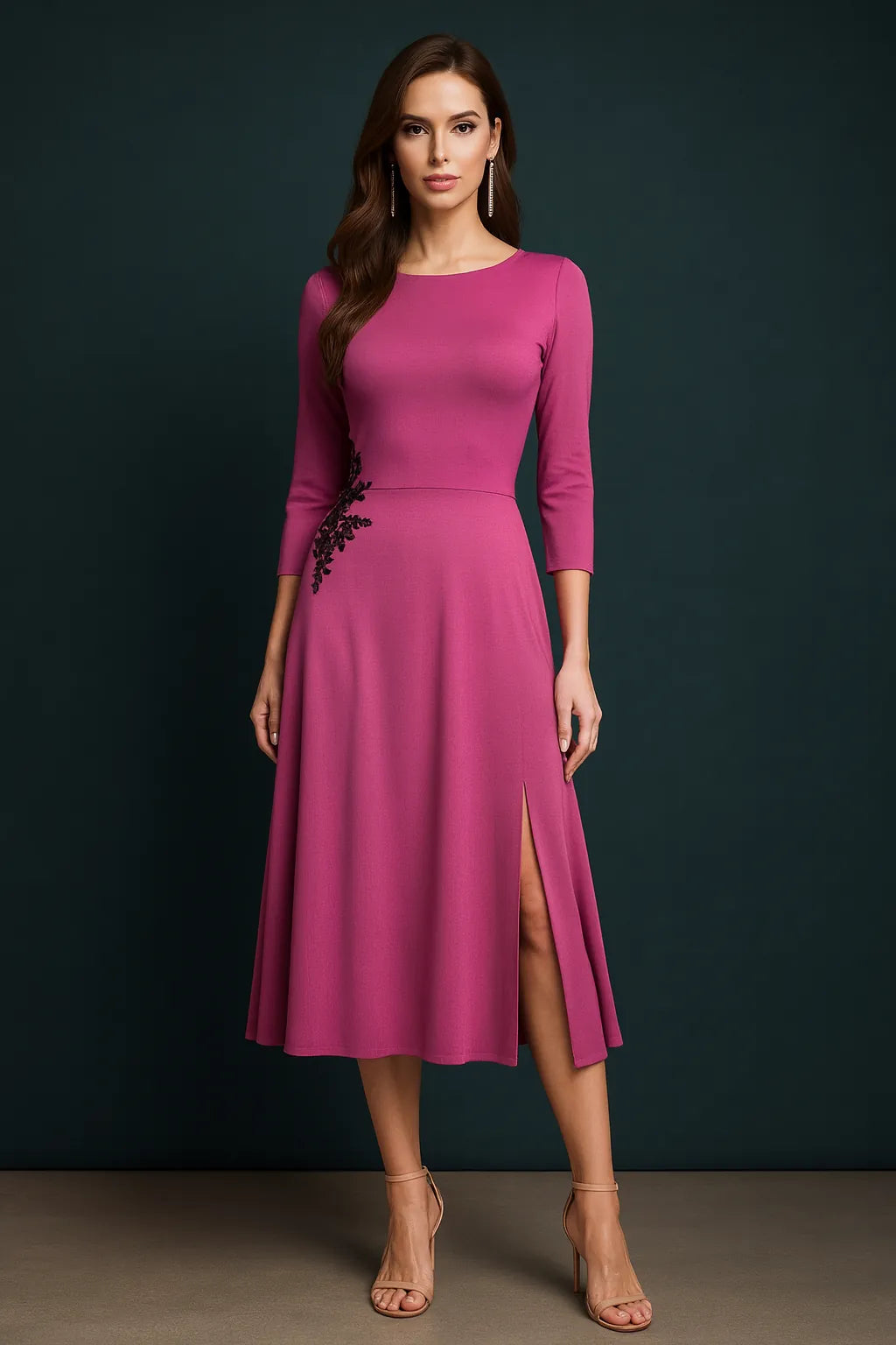 Woman wearing a pink tango dress with a slit on a dark background