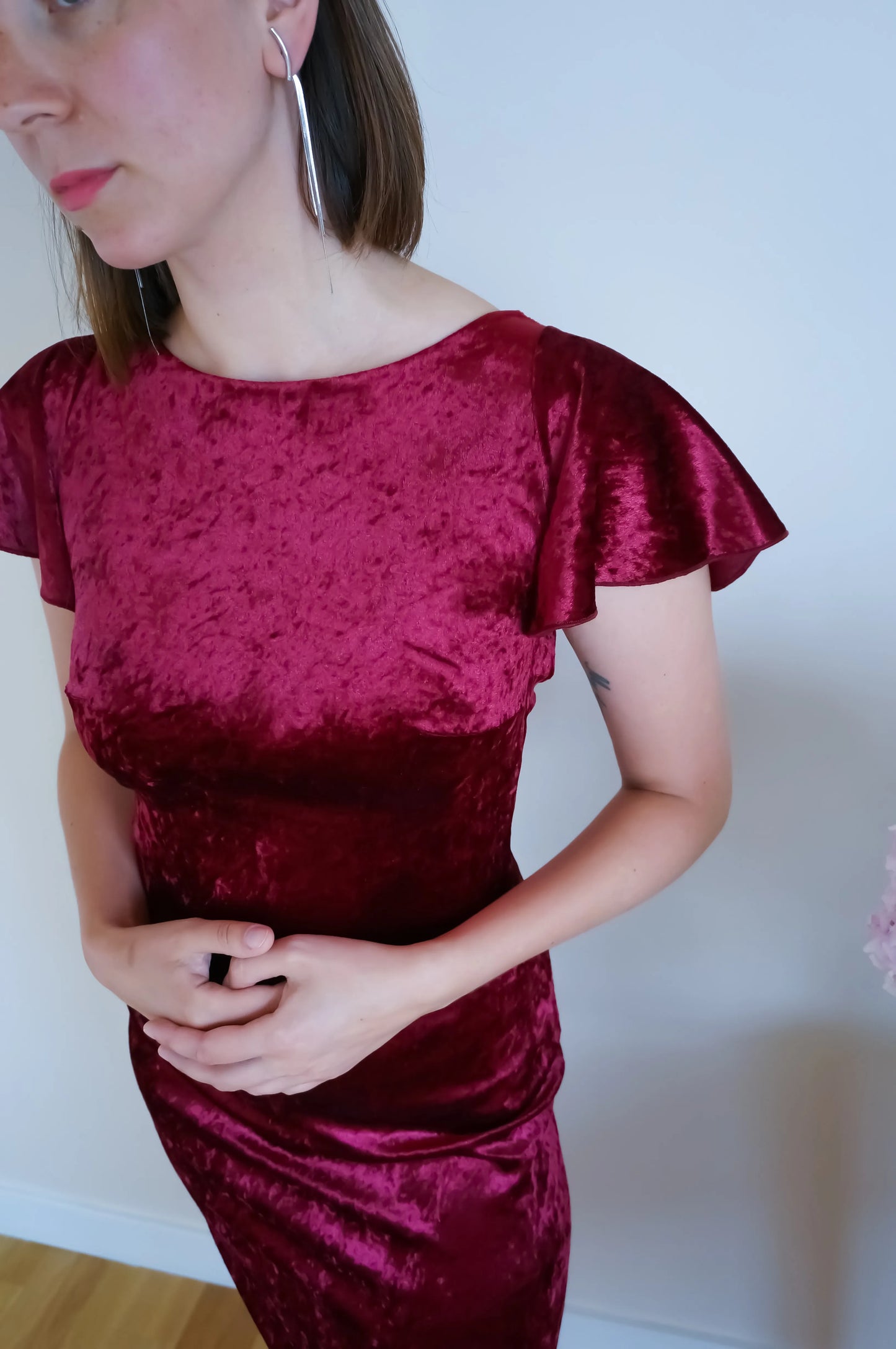 Deep burgundy velvet tango dress with flutter sleeves and open back