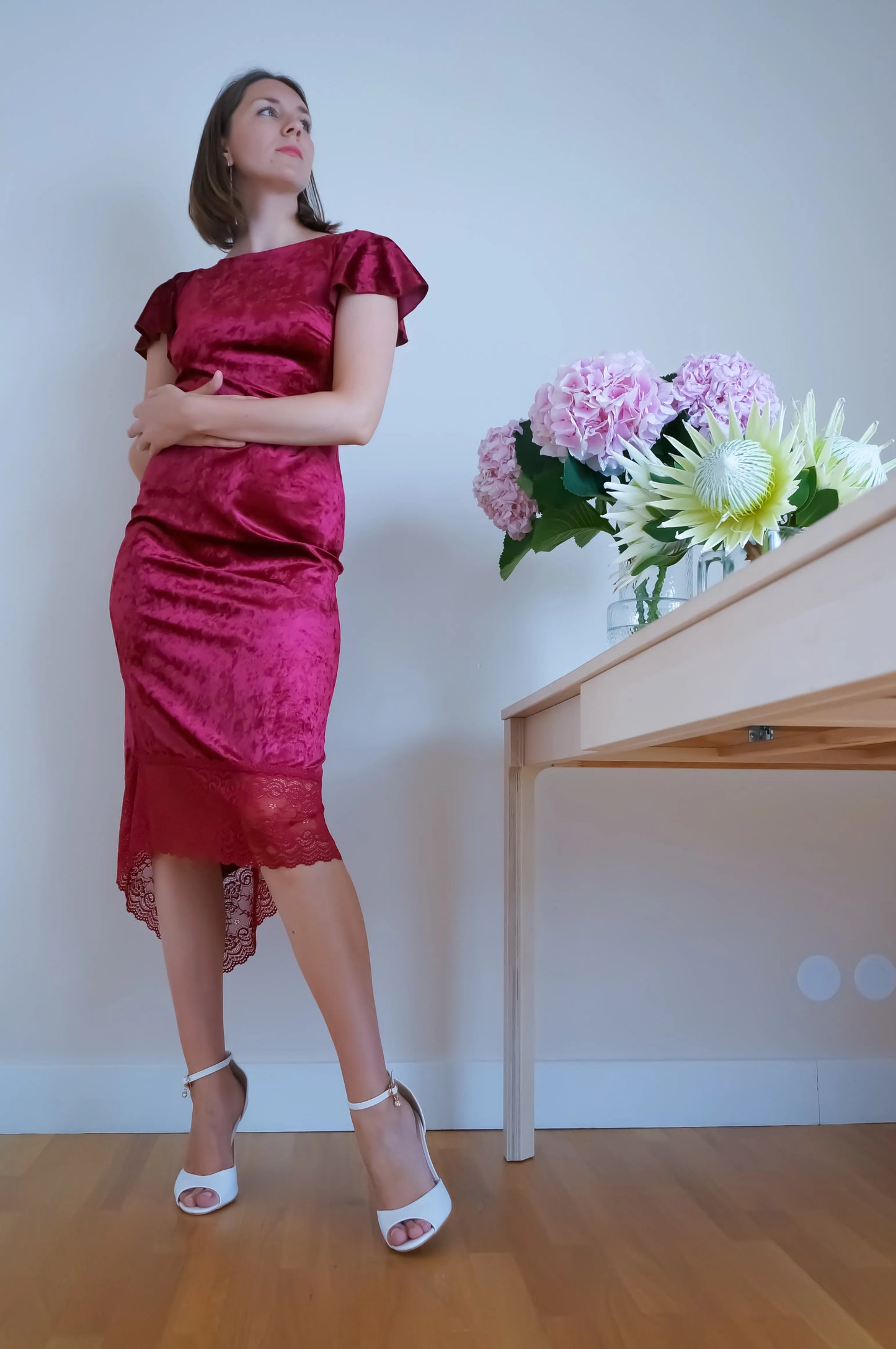 Deep burgundy velvet tango dress with flutter sleeves and open back