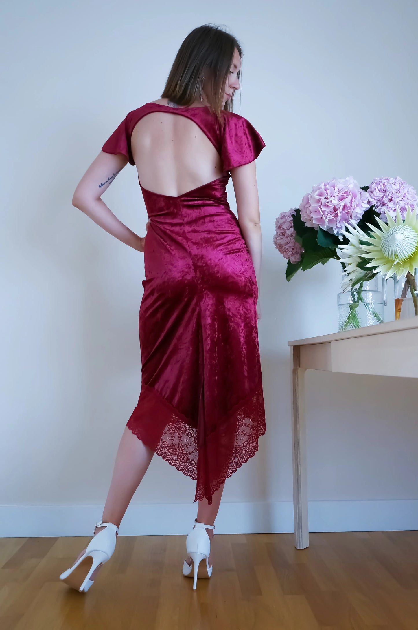 Deep burgundy velvet tango dress with flutter sleeves and open back