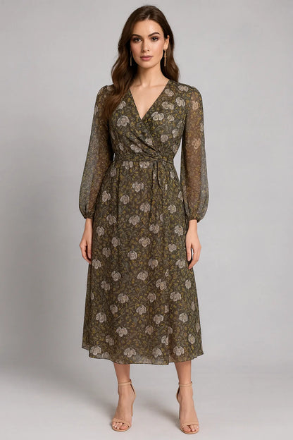 Woman wearing a green floral tango dress on a gray background