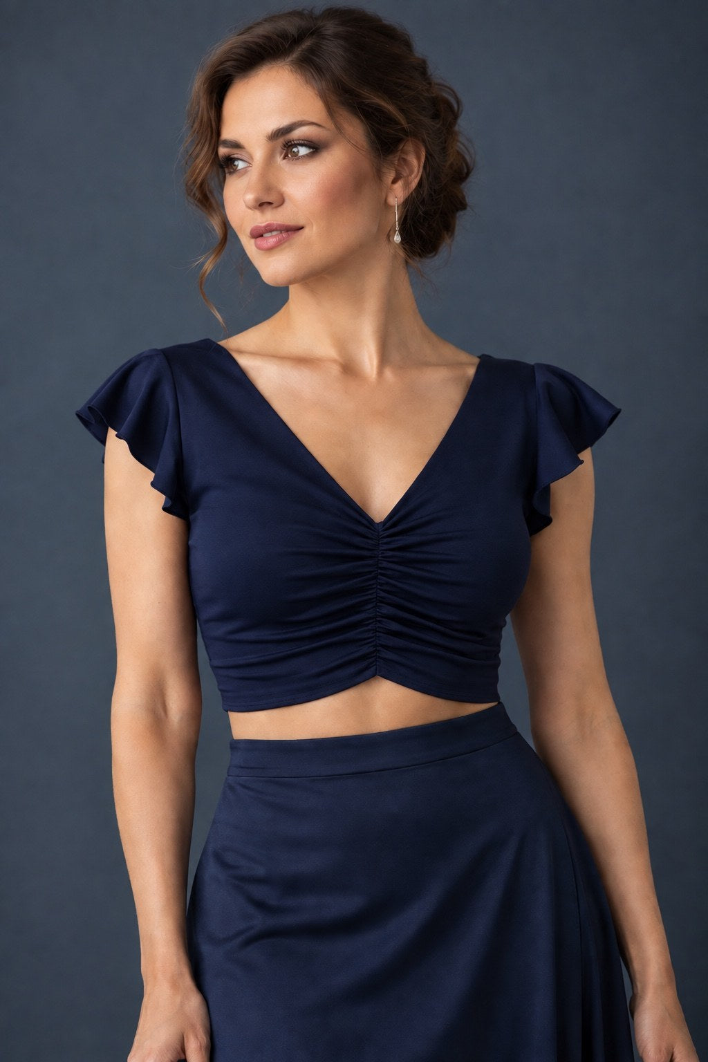 Navy women’s tango crop top with flutter sleeves and gathered V-neckline