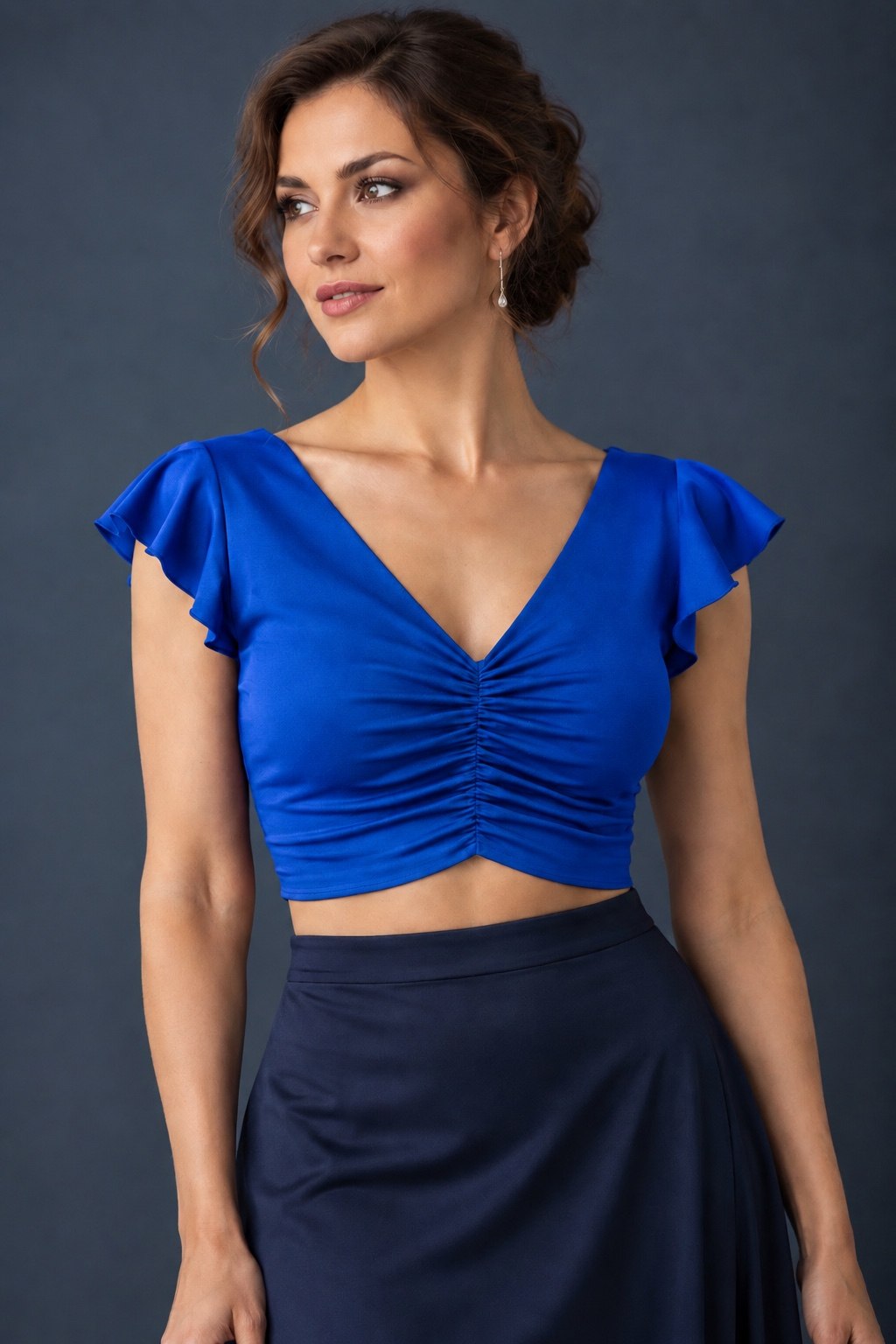 blue women’s tango crop top with flutter sleeves and gathered V-neckline