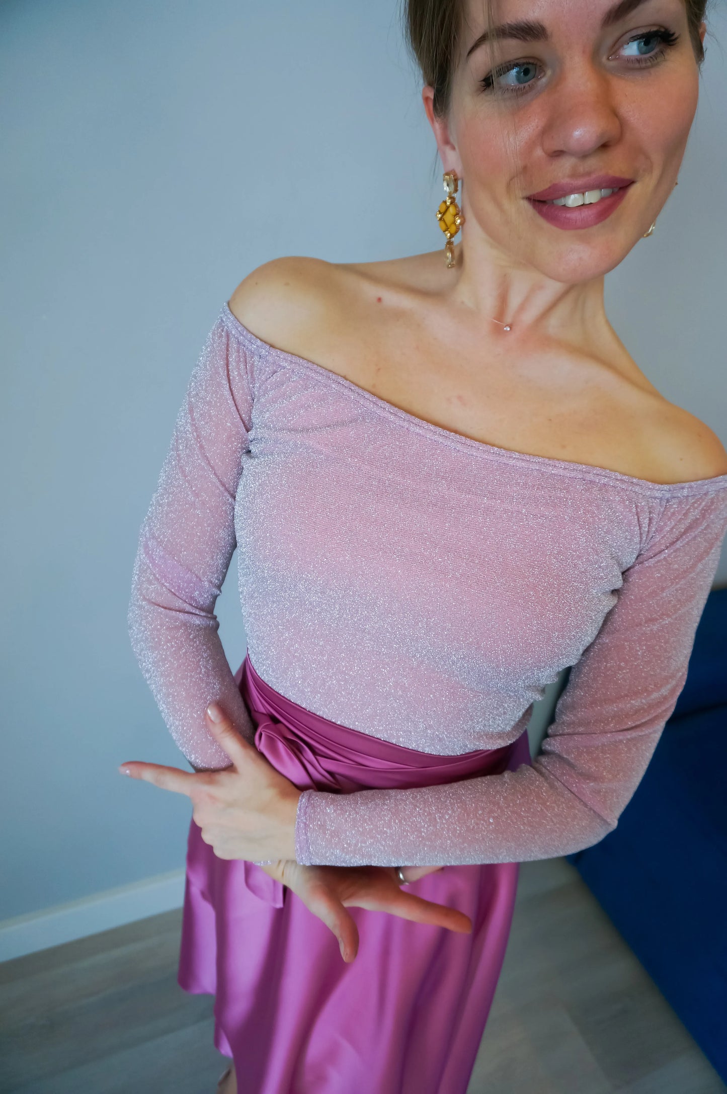 Pink off-shoulder shimmer tango top with long sleeves
