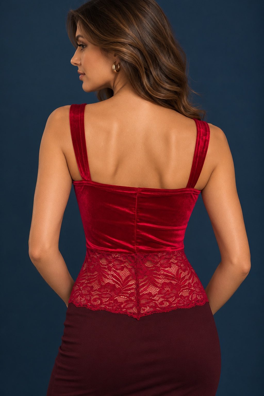 Back view of a red silky velvet tango top with wide straps, square open back and elastic floral lace panel at the waist.