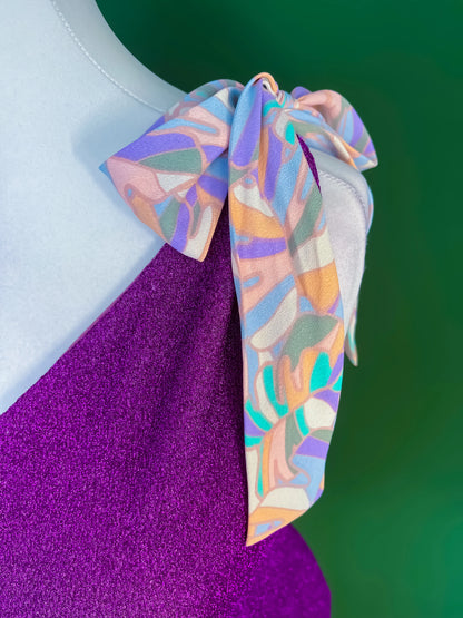 Shimmering one-shoulder tango top with bow detail