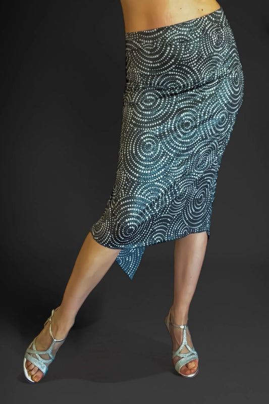 Tango skirt with circular pattern worn by a woman on a grey background