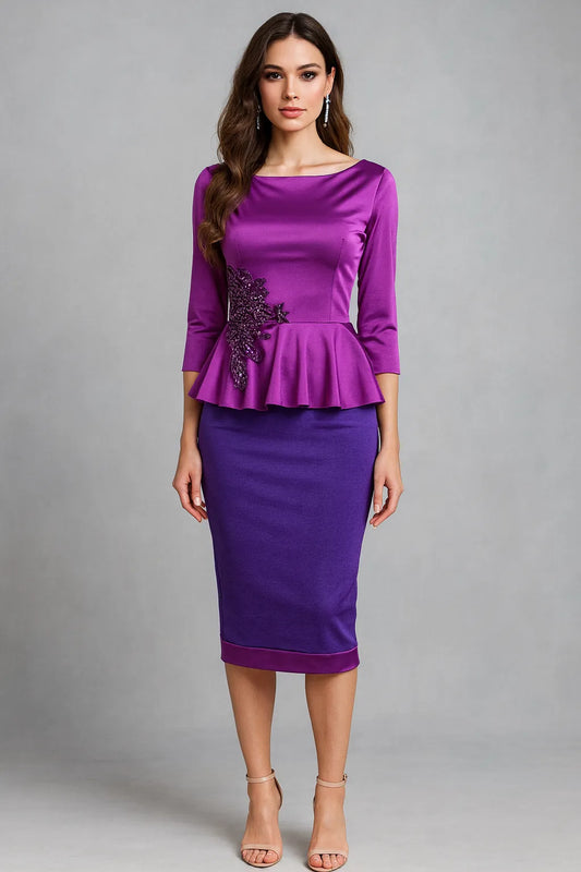 Woman wearing a purple tango top and blue tango skirt on a gray background