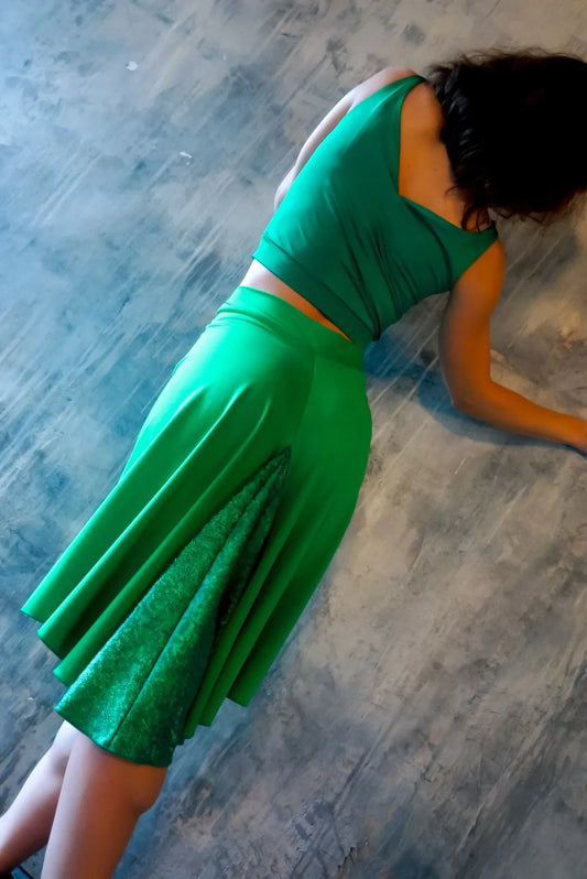 Woman wearing a green tango skirt
