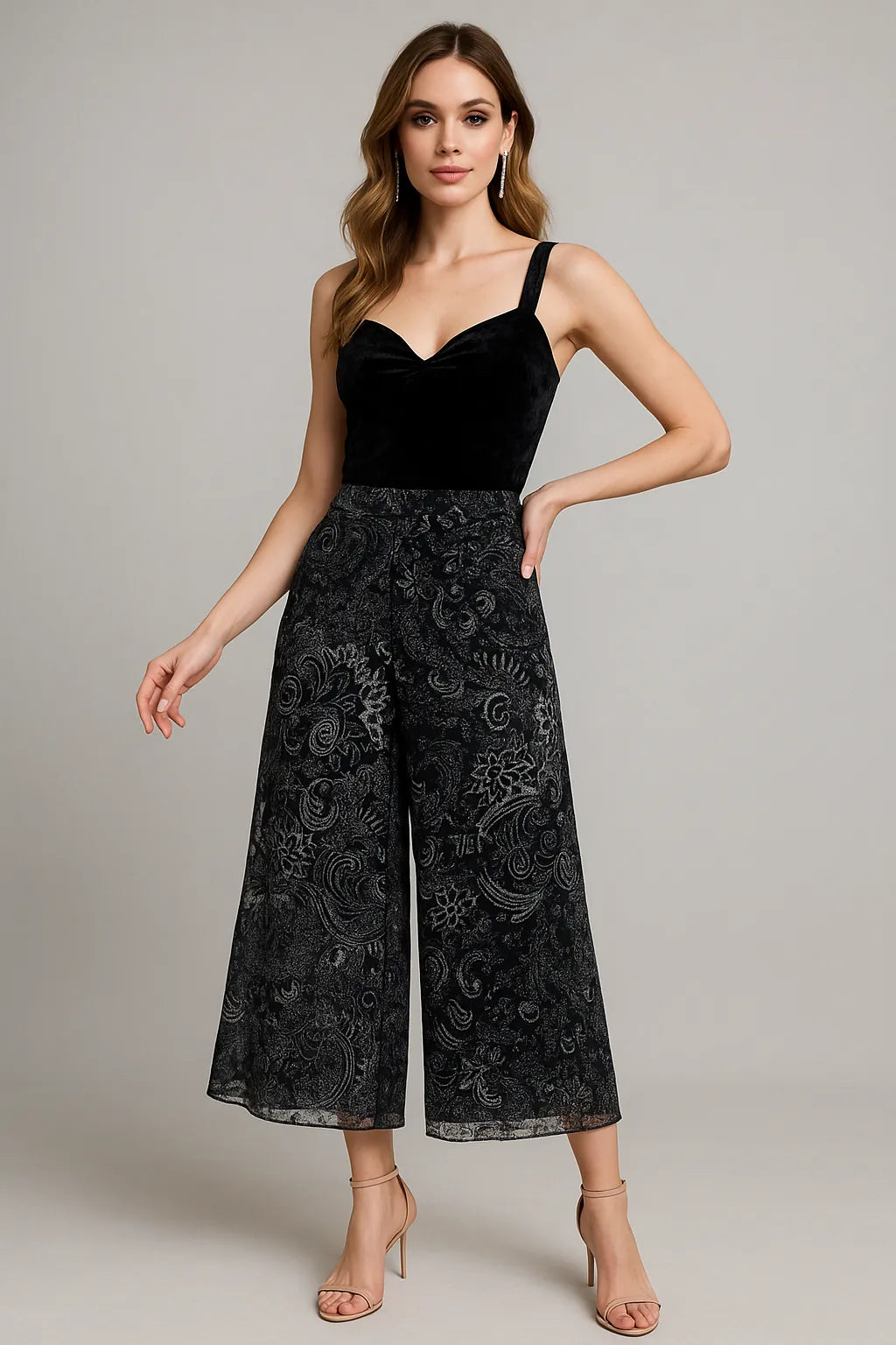 Woman wearing a black top and black lace tango pants