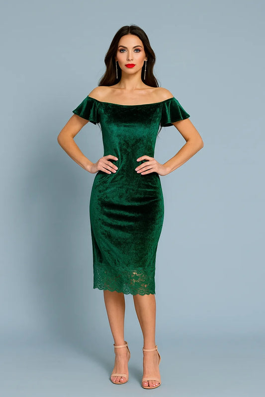 Woman wearing a green off-shoulder tango dress against a gray background