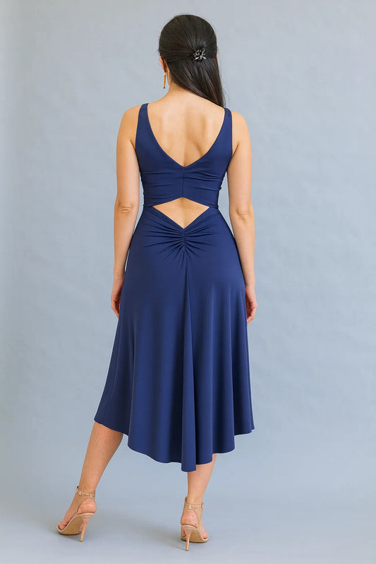 Navy blue tango dress with cutout back on a gray background