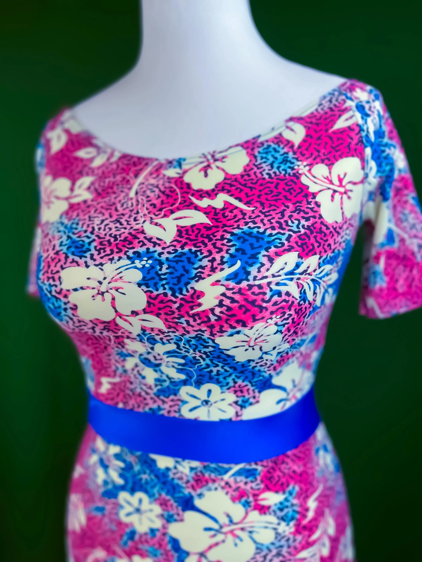 Bold off-shoulder tango dress with flowing tail