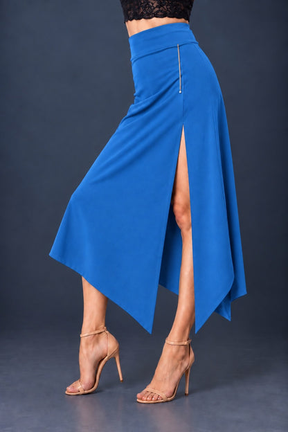 Blue asymmetric jersey tango skirt with wide waistband, front slit and angled hem.