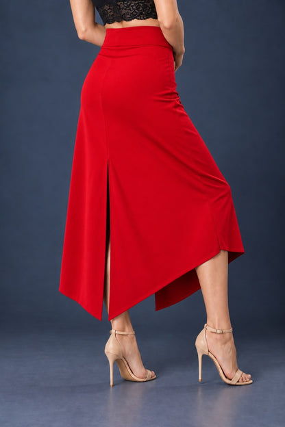 Back view of red asymmetric jersey tango skirt with wide waistband, back slit and angled hem.