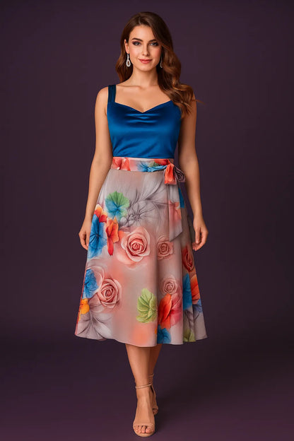 Woman wearing a blue tango top and floral tango skirt