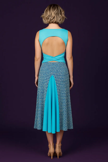 Woman wearing a turquoise tango top and midi tango skirt, back view
