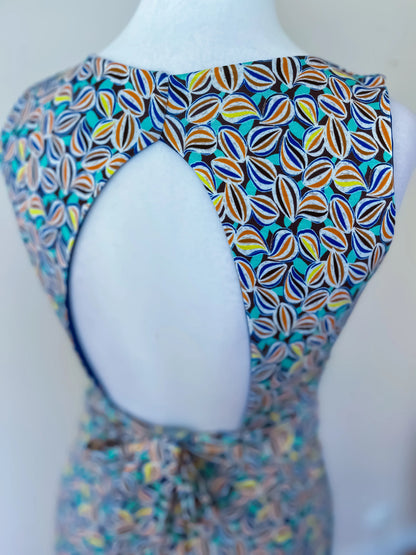 Colorful patterned tango top on a mannequin, back view