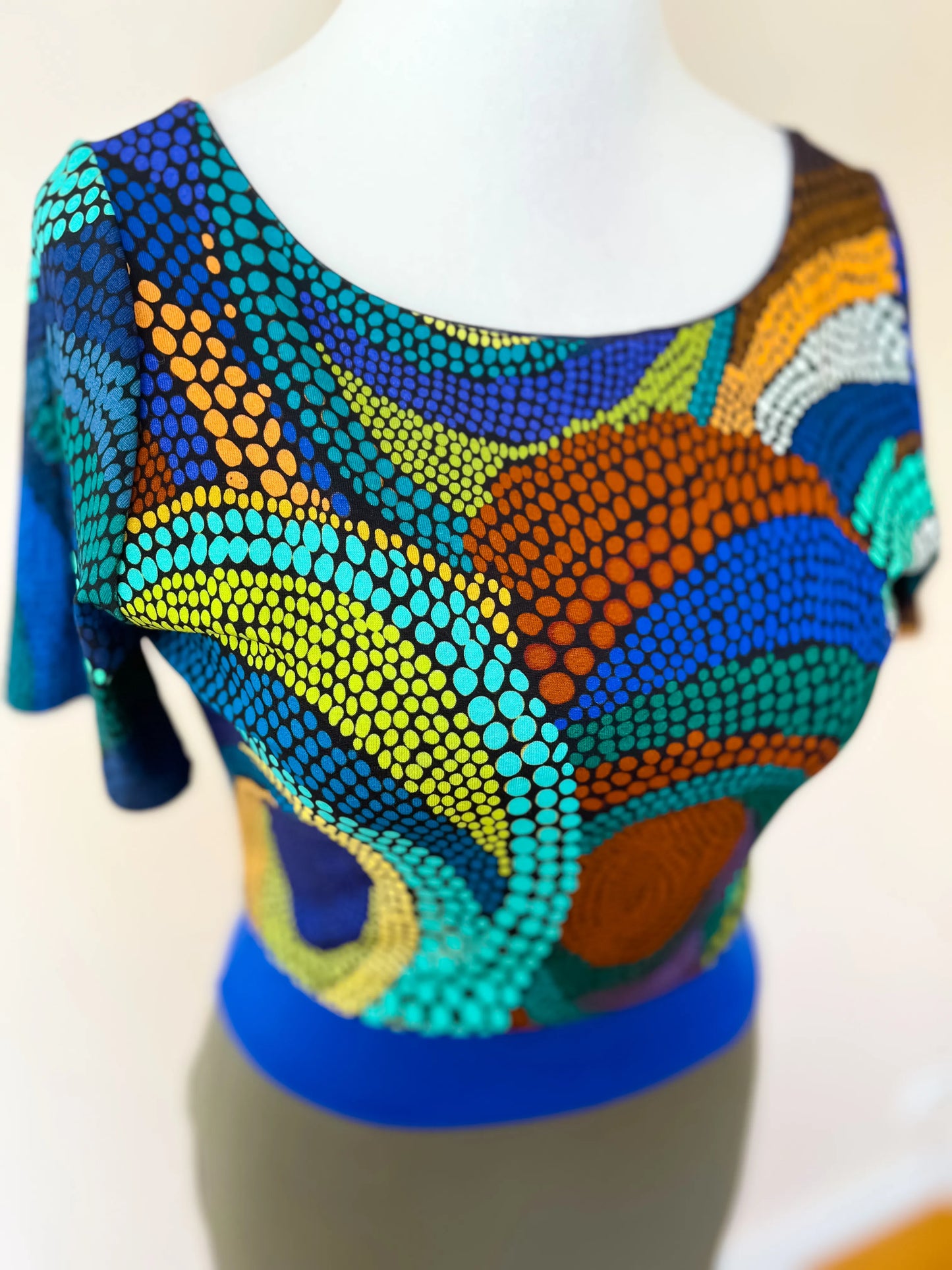 Elegant tango dress made of soft, stretchy knit with a matching belt