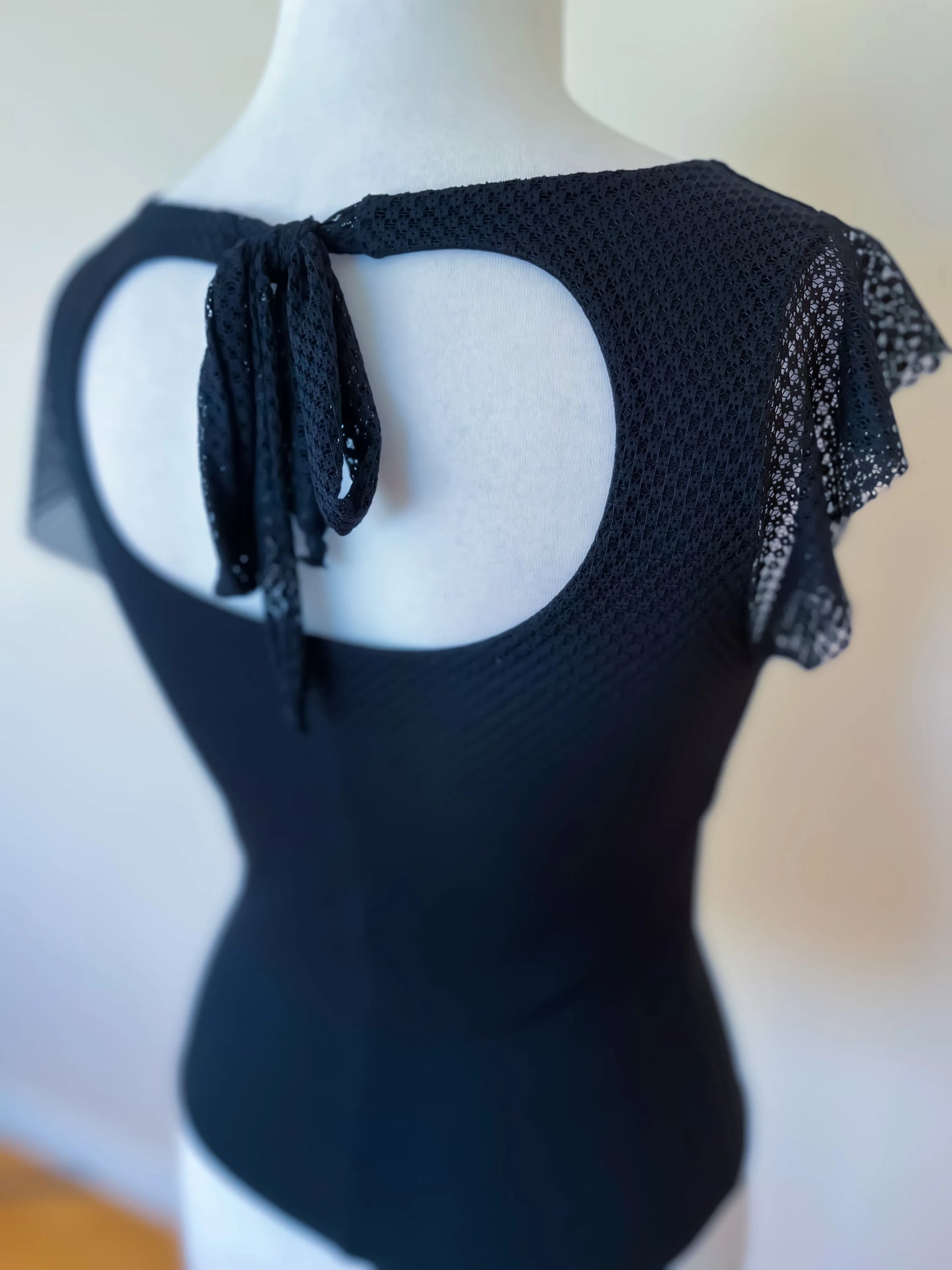 Black Tango top with flutter sleeves