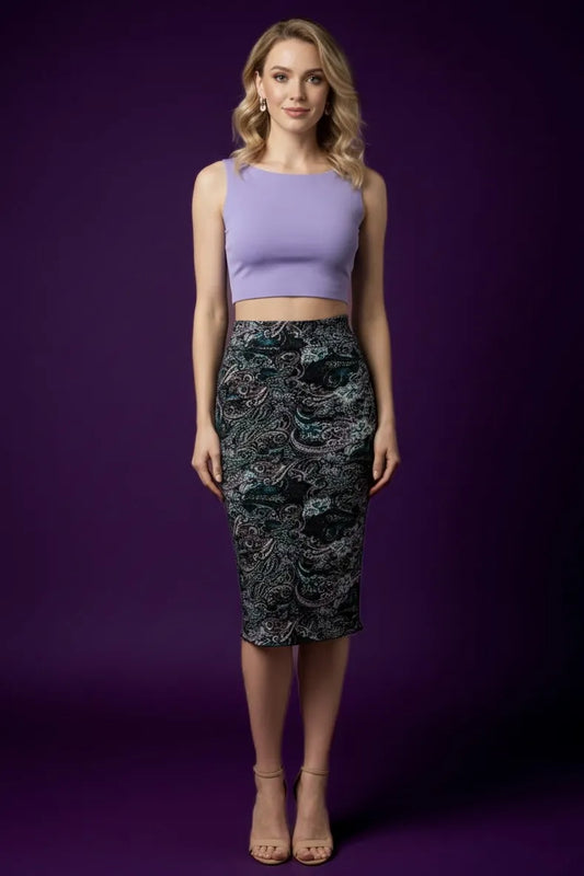 Woman wearing a purple tango top and patterned tango skirt
