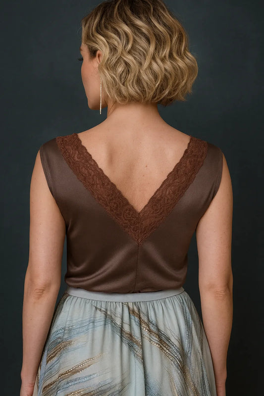 Woman wearing a chocolate jersey tango top with lace detail, back view