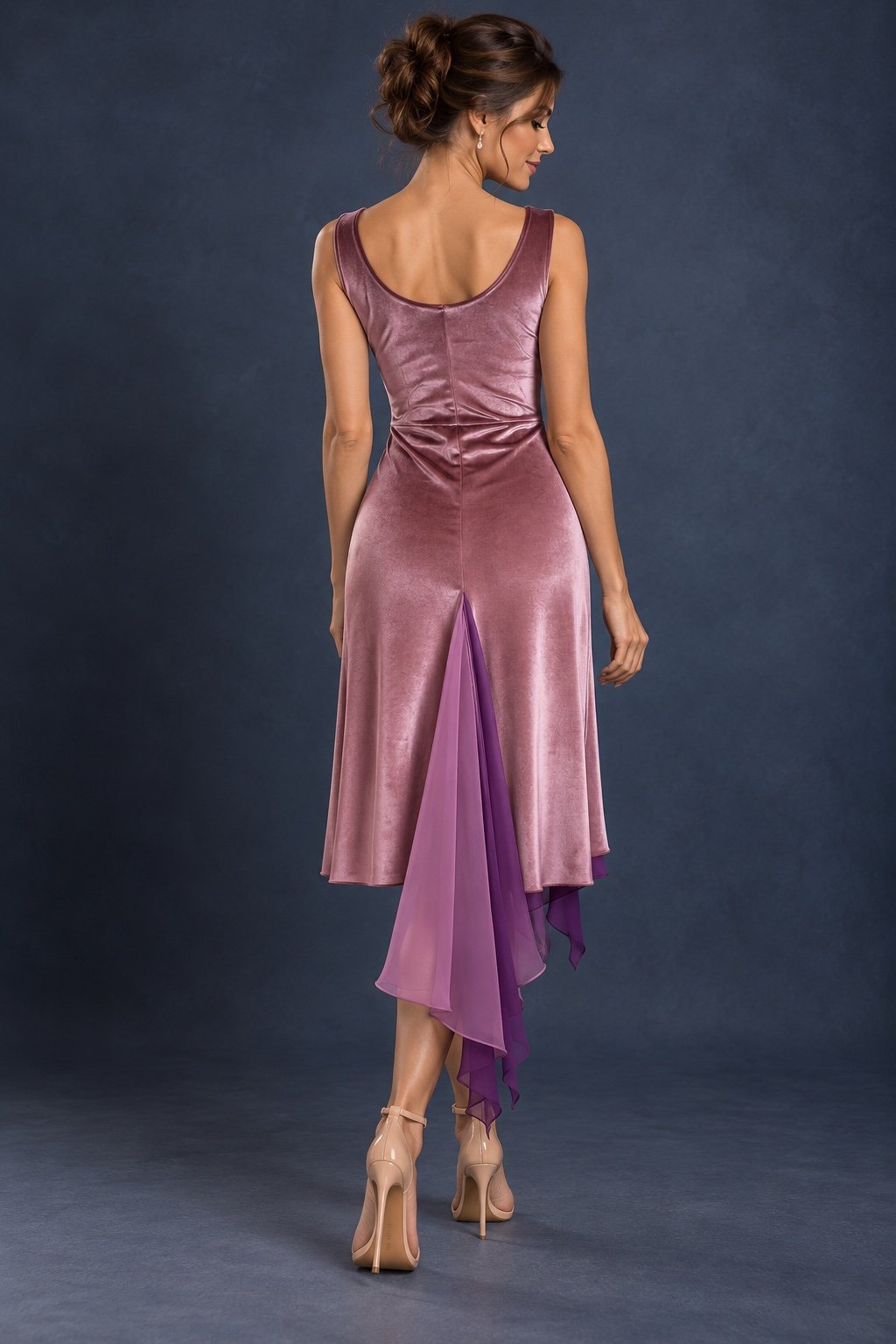 Back view of a dusty rose satin velvet tango dress with a back slit and layered chiffon godets, designed for elegant movement in Argentine tango.