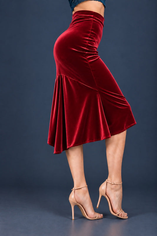 Women’s velvet tango skirt with a fitted silhouette, wide waistband and flowing asymmetric tail at the back, shown from front and side views.