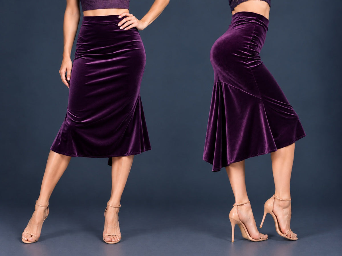 Women’s velvet tango skirt with a fitted silhouette, wide waistband and flowing asymmetric tail at the back, shown from front and side views.