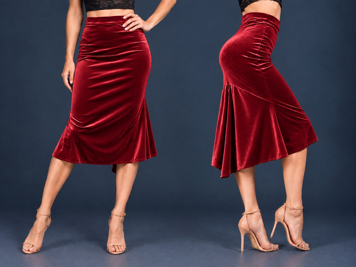 Women’s velvet tango skirt with a fitted silhouette, wide waistband and flowing asymmetric tail at the back, shown from front and side views.