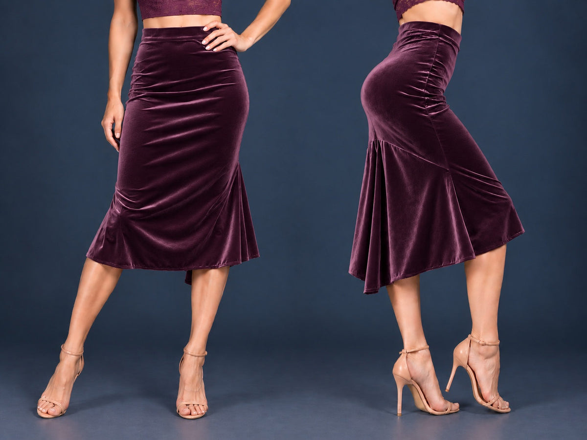 Women’s velvet tango skirt with a fitted silhouette, wide waistband and flowing asymmetric tail at the back, shown from front and side views.