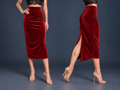 Women’s black velvet tango skirt with a fitted midi silhouette, wide waistband, gathered back, back slit and distinctive swallowtail hem, shown from front and side views.