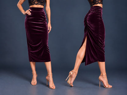 Women’s black velvet tango skirt with a fitted midi silhouette, wide waistband, gathered back, back slit and distinctive swallowtail hem, shown from front and side views.