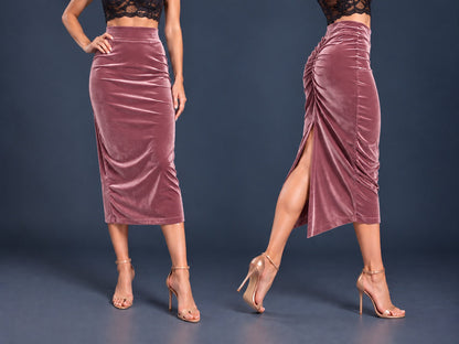 Women’s black velvet tango skirt with a fitted midi silhouette, wide waistband, gathered back, back slit and distinctive swallowtail hem, shown from front and side views.