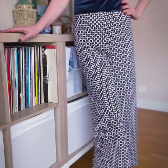 Video of a woman in geometric high-waisted tango pants