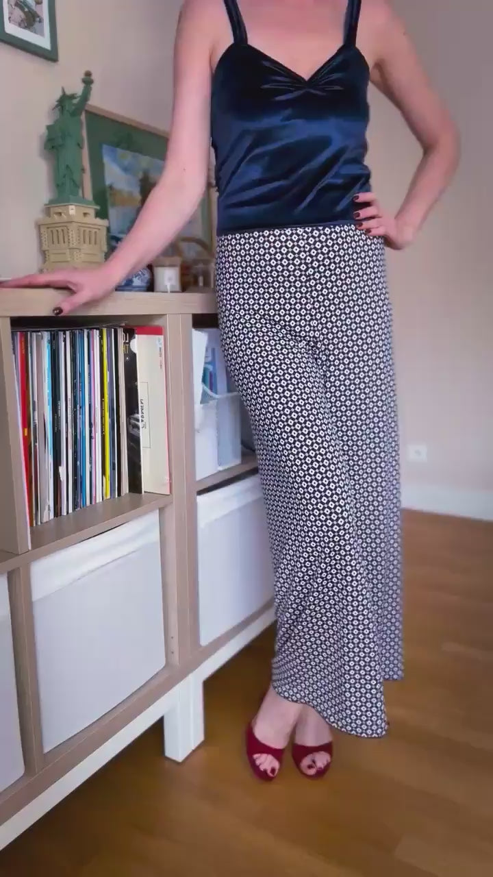 Video of a woman in geometric high-waisted tango pants