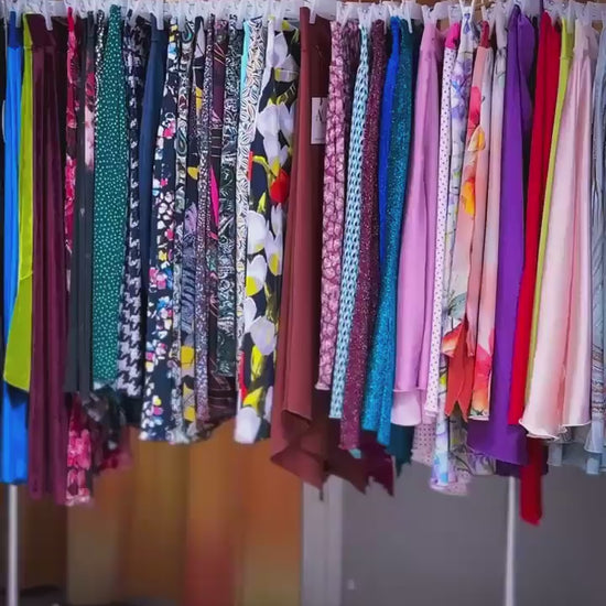 Video of a woman wearing a blue velvet tango skirt with high waist