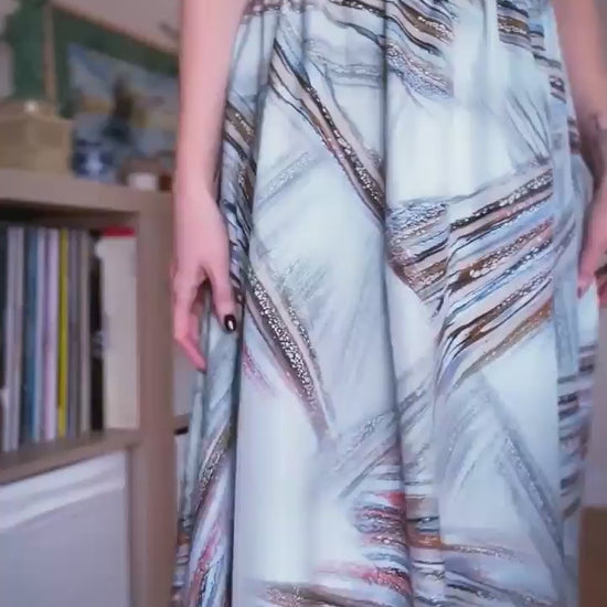 Video of a woman in two layer flowing tango skirt