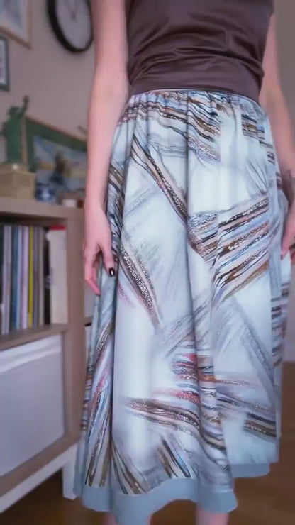 Video of a woman in two layer flowing tango skirt
