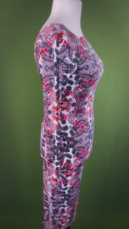 Elegant knit tango dress with deep v-back and knot detail