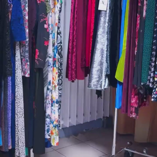 Woman wearing a blue velvet tango dress