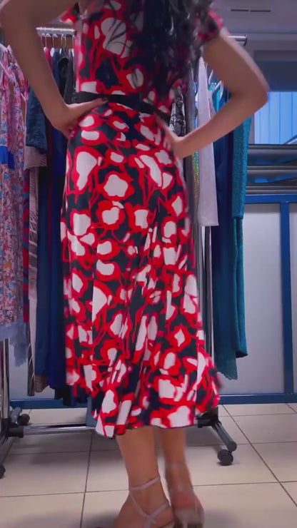 Graceful stretch jersey tango dress with flutter sleeves and back tail