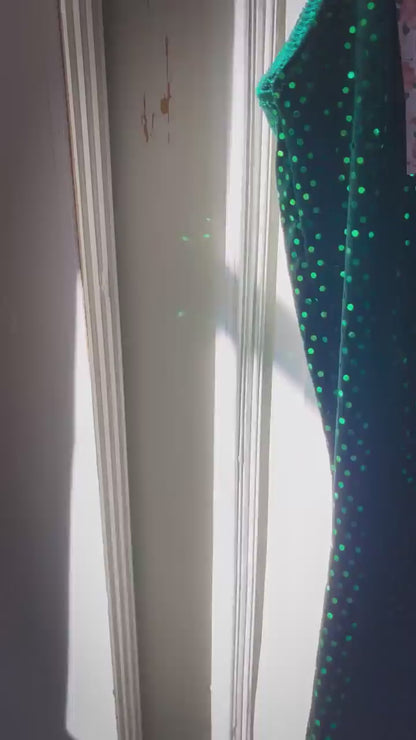 Emerald green velvet tango dress with deep V-neckline